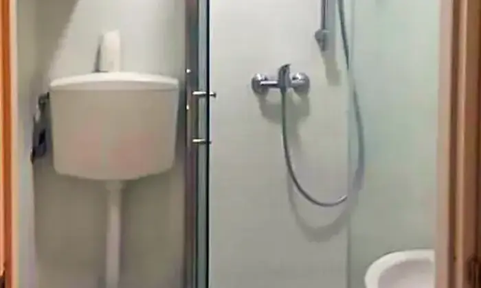 Rexer-Milano-Posto-letto-in-camera-doppia-BAGNO
