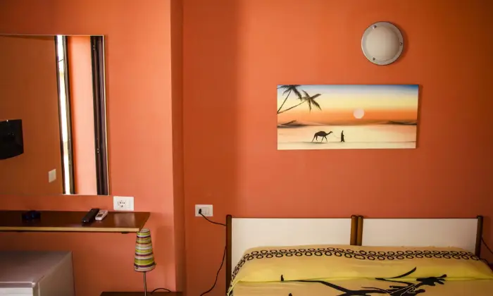 Rexer-Siniscola-Camera-tramonto-CAMERA-DA-LETTO