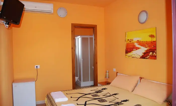 Rexer-Siniscola-Camera-tramonto-CAMERA-DA-LETTO