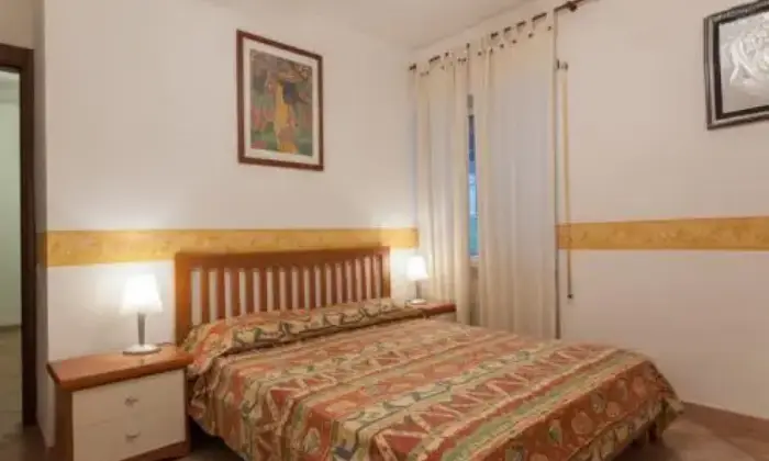Rexer-Fiumicino-Appartament-Passoscuro-Bambin-Ges-CAMERA-DA-LETTO