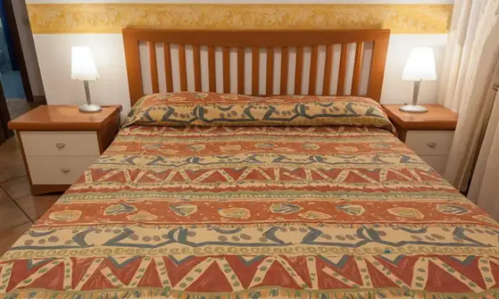 Rexer-Fiumicino-Appartament-Passoscuro-Bambin-Ges-CAMERA-DA-LETTO