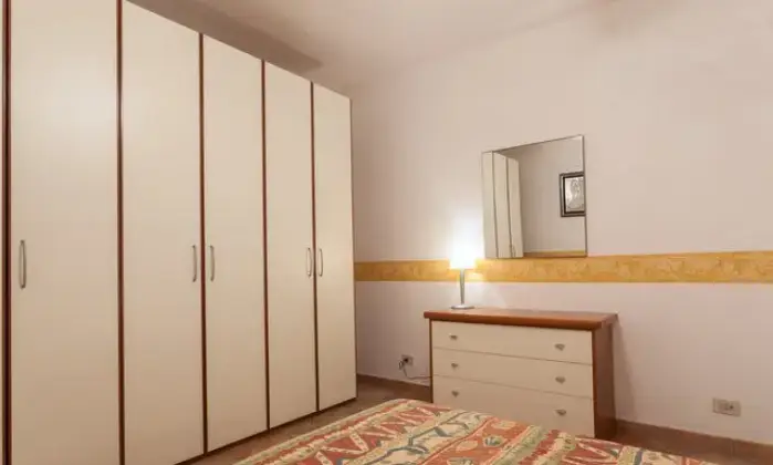 Rexer-Fiumicino-Appartament-Passoscuro-Bambin-Ges-CAMERA-DA-LETTO