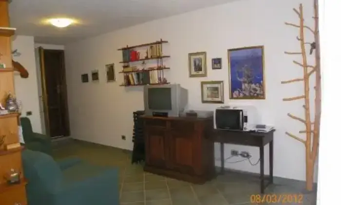Rexer-Loiri-Porto-San-Paolo-Appartamento-fronte-isola-di-tavolara-SALONE