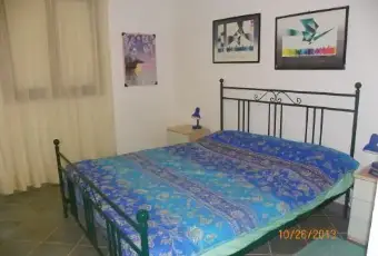 Rexer-Loiri-Porto-San-Paolo-Appartamento-fronte-isola-di-tavolara-CAMERA-DA-LETTO