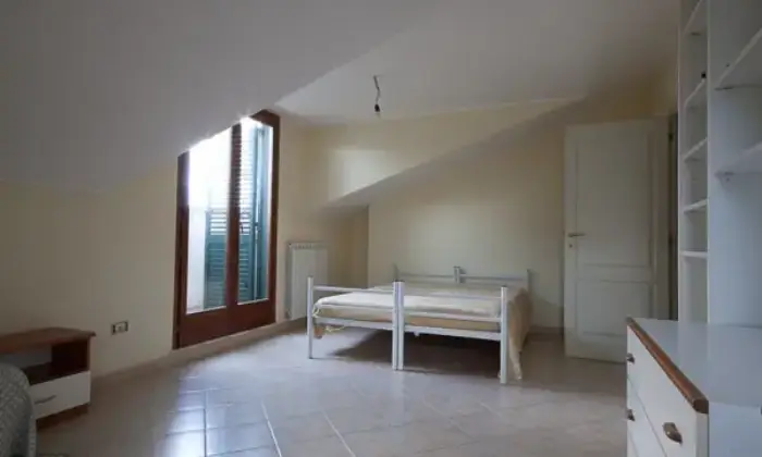 Rexer-Pineto-Casa-mare-posti-letto-CAMERA-DA-LETTO