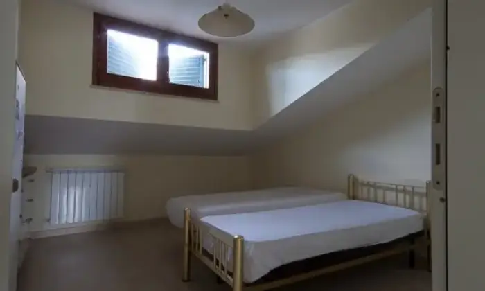Rexer-Pineto-Casa-mare-posti-letto-CAMERA-DA-LETTO
