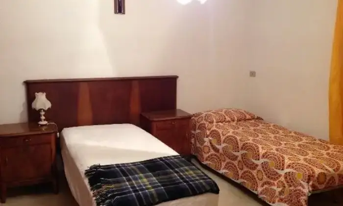 Rexer-Pisticci-Bilocale-per-vacanze-CAMERA-DA-LETTO