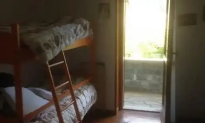 Rexer-Bardonecchia-Bilocale-arredato-a-Bardonecchia-CAMERA-DA-LETTO