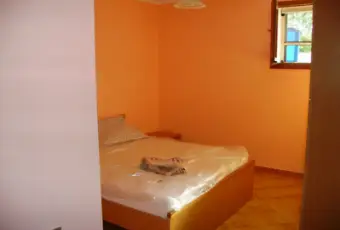 Rexer-Budoni-Trilocale-a-due-passi-dal-mare-CAMERA-DA-LETTO