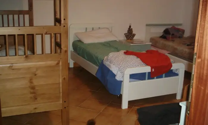 Rexer-Budoni-Trilocale-a-due-passi-dal-mare-CAMERA-DA-LETTO