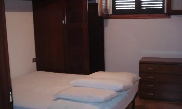 Rexer-Budoni-Trilocale-a-due-passi-dal-mare-CAMERA-DA-LETTO
