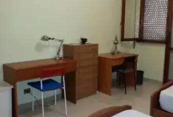 Rexer-Roma-Affitto-ampia-doppia-a-studentesse-zona-Tiburtina-CAMERA-DA-LETTO