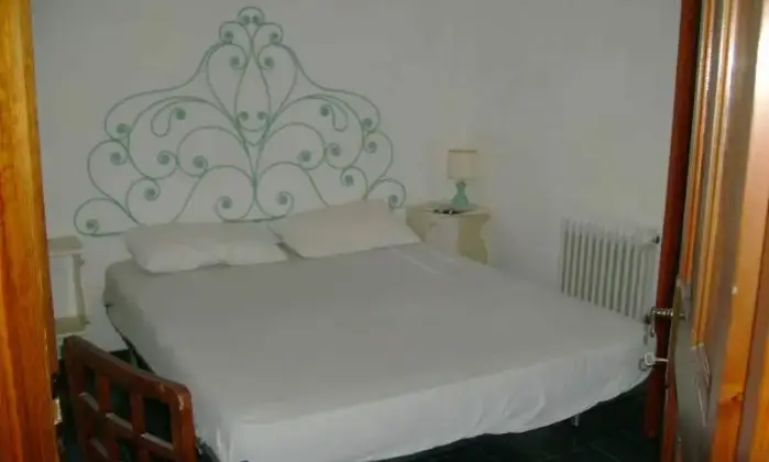 Rexer-San-Felice-Circeo-Appartamento-a-pochi-passi-dal-mare-con-vista-panoramica-sulle-isole-pontine-CAMERA-DA-LETTO