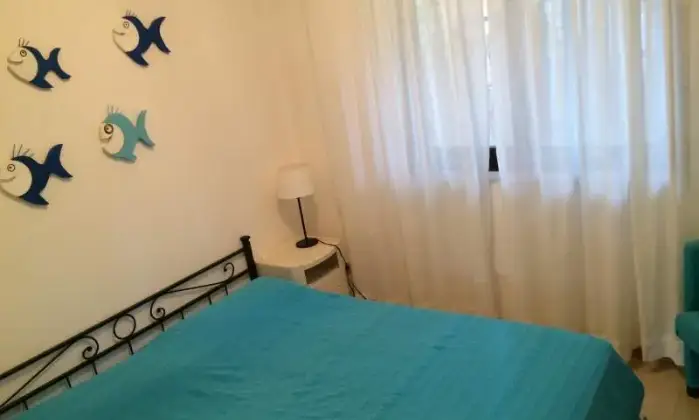 Rexer-Monte-Argentario-Appartamento-a-Porto-Ercole-con-bellissimo-terrazzo-panoramico-CAMERA-DA-LETTO