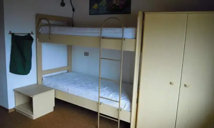 Rexer-Abetone-Caratteristico-appartamento-trilivello-sulle-piste-CAMERA-DA-LETTO