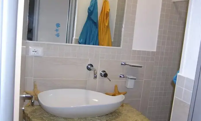 Rexer-Stintino-Appartamento-in-magnifico-scenario-con-terrazzo-con-vista-mare-BAGNO
