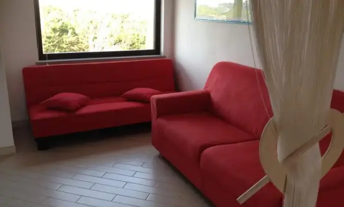 Rexer-Stintino-Appartamento-in-magnifico-scenario-con-terrazzo-con-vista-mare-SALONE