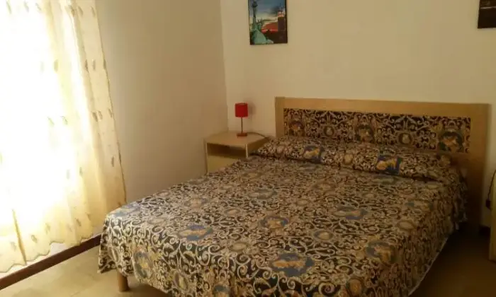 Rexer-Tresnuraghes-Grazioso-appartamento-sulla-spiaggia-CAMERA-DA-LETTO