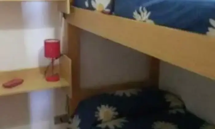 Rexer-Tresnuraghes-Grazioso-appartamento-sulla-spiaggia-CAMERA-DA-LETTO