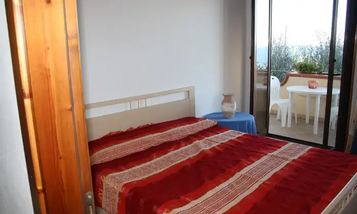 Rexer-Parghelia-Appartamenti-vacanze-in-residence-CAMERA-DA-LETTO