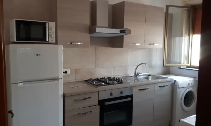 Rexer-Catania-Appartamenti-villaggio-cielo-azzurro-vicini-alla-spiaggia-CUCINA