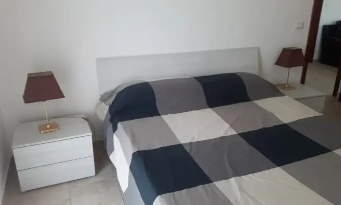 Rexer-Catania-Appartamenti-villaggio-cielo-azzurro-vicini-alla-spiaggia-CAMERA-DA-LETTO