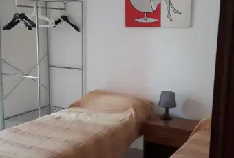 Rexer-Catania-Appartamenti-villaggio-cielo-azzurro-vicini-alla-spiaggia-CAMERA-DA-LETTO