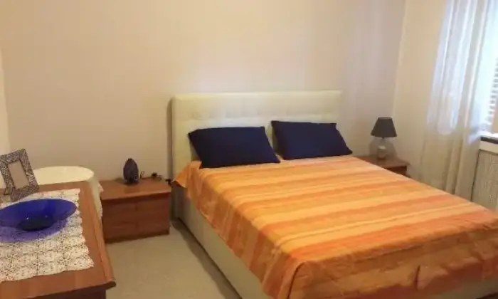 Rexer-Rozzano-Brevi-soggiorni-vicino-Humanitas-CAMERA-DA-LETTO