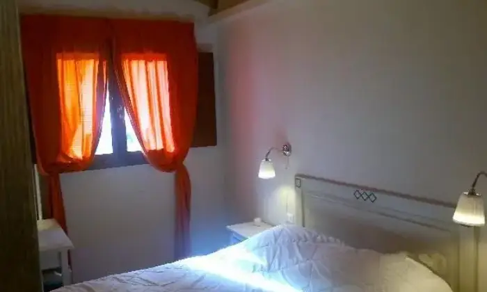 Rexer-Abetone-Romantico-appartamento-in-montagna-CAMERA-DA-LETTO