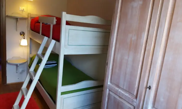 Rexer-Abetone-Romantico-appartamento-in-montagna-CAMERA-DA-LETTO