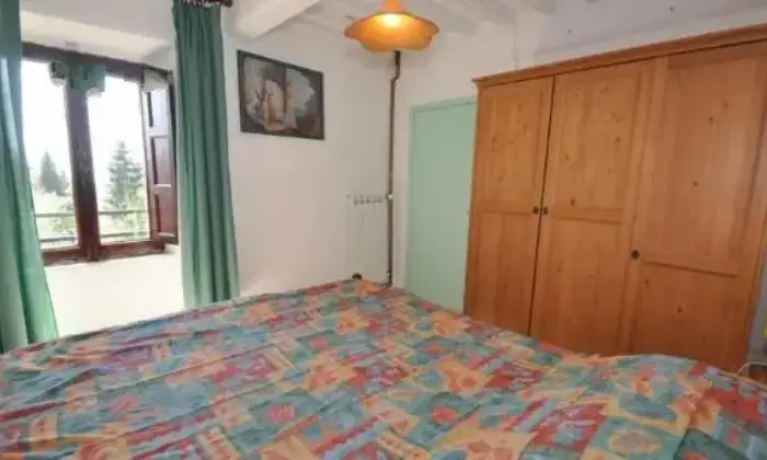 Rexer-Pescaglia-Appartamenti-casa-vacanza-CAMERA-DA-LETTO