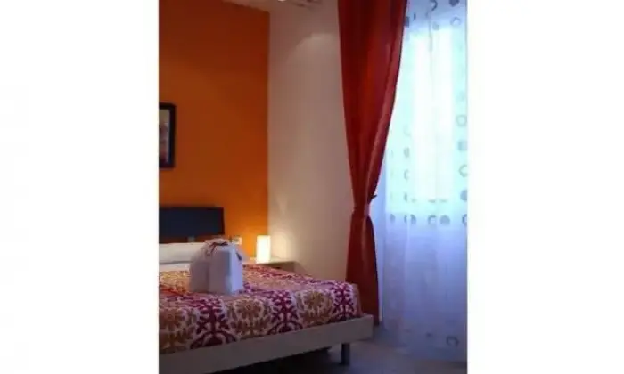 Rexer-Roma-Camera-in-Bed-Breakfast-Sotto-il-cielo-di-Roma-CAMERA-DA-LETTO
