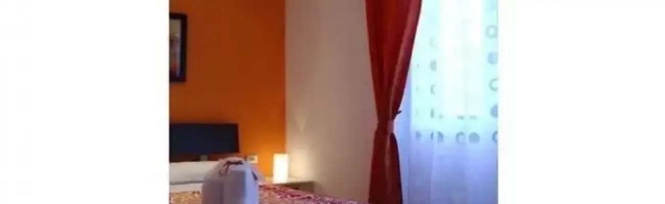 Rexer-Roma-Camera-in-Bed-Breakfast-Sotto-il-cielo-di-Roma-CAMERA-DA-LETTO