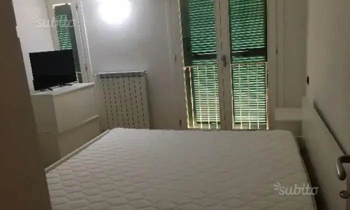 Rexer-Lerici-Accogliente-Appartamento-con-vista-mare-CAMERA-DA-LETTO