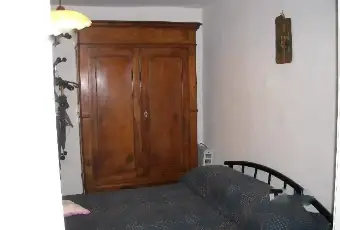 Rexer-Demonte-Trilocale-stile-montanaro-piano-terra-CAMERA-DA-LETTO