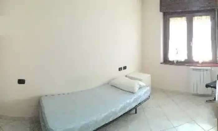 Rexer-Roma-Stanza-singola-arredata-zona-Giardinetti-CAMERA-DA-LETTO