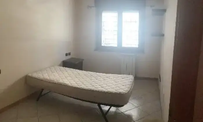 Rexer-Roma-Stanza-singola-zona-Giardinetti-CAMERA-DA-LETTO