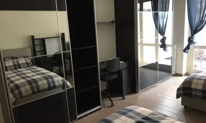 Rexer-Roma-Posto-letto-in-camera-doppia-zona-stazione-Tiburtina-CAMERA-DA-LETTO