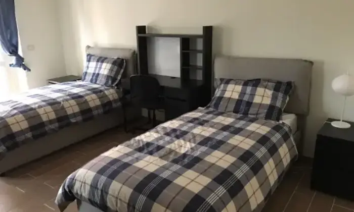 Rexer-Roma-Posto-letto-in-camera-doppia-zona-stazione-Tiburtina-CAMERA-DA-LETTO