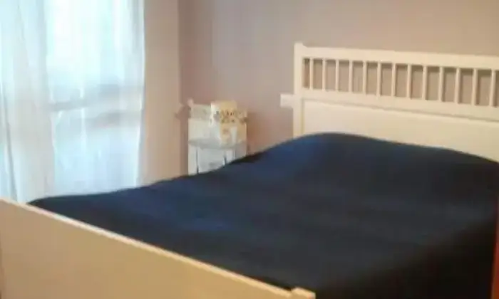Rexer-Roma-Bilocale-spazioso-nel-verde-CAMERA-DA-LETTO