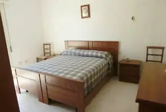 Rexer-Calasetta-Appartamento-centro-paese-a-mt-dal-portIcciolo-turistico-CAMERA-DA-LETTO