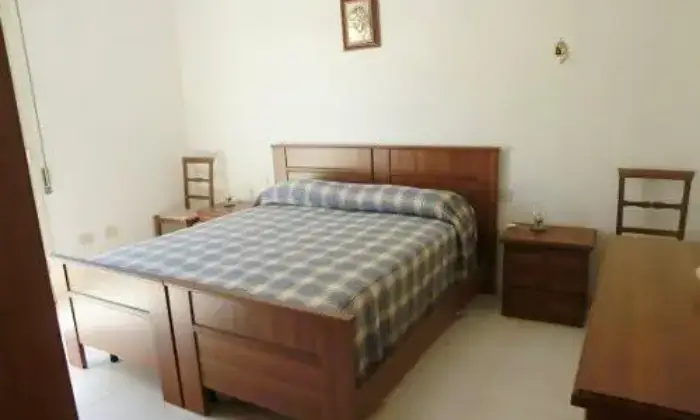 Rexer-Calasetta-Appartamento-centro-paese-a-mt-dal-portIcciolo-turistico-CAMERA-DA-LETTO