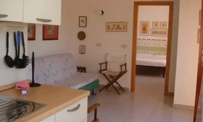 Rexer-Porto-Coda-Cavallo-Grazioso-bilocale-sul-mare-CUCINA
