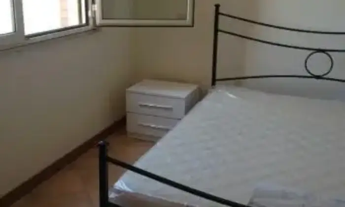 Rexer-Nettuno-Luminoso-bilocale-vista-mare-CAMERA-DA-LETTO