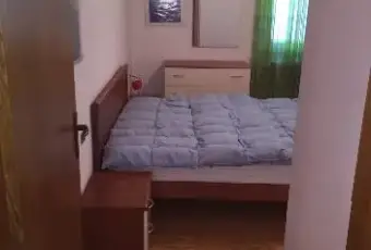 Rexer-Madesimo-Pratico-bilocale-CAMERA-DA-LETTO