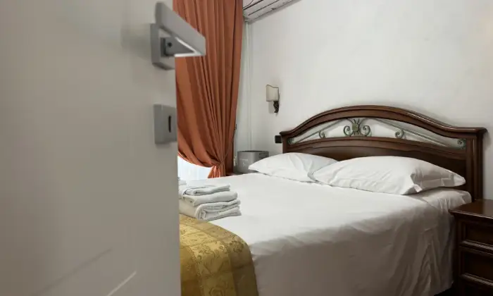 Rexer-Fiumicino-Appartamento-in-CASE-VACANZA-EURO-HOUSE-INN-CameraDaLetto