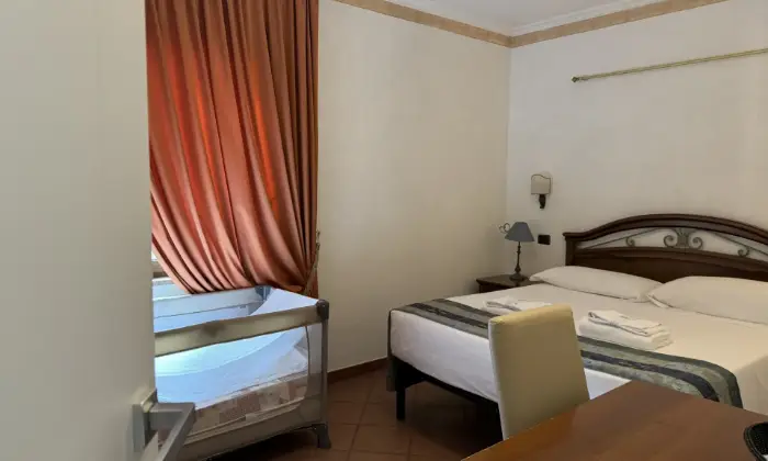Rexer-Fiumicino-Appartamento-in-CASE-VACANZA-EURO-HOUSE-INN-CameraDaLetto