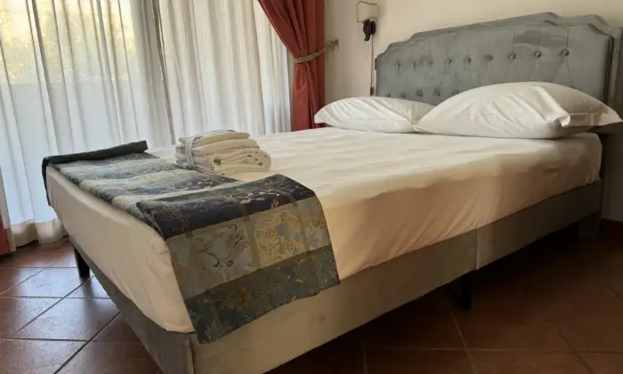 Rexer-Fiumicino-Appartamento-in-CASE-VACANZA-EURO-HOUSE-INN-CameraDaLetto