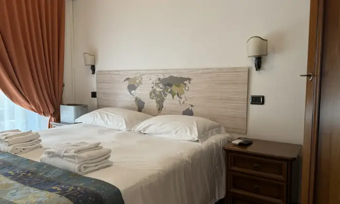 Rexer-Fiumicino-Appartamento-in-CASE-VACANZA-EURO-HOUSE-INN-CameraDaLetto