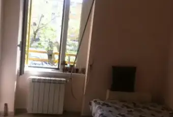 Rexer-Milano-Camera-singola-arredata-CAMERA-DA-LETTO